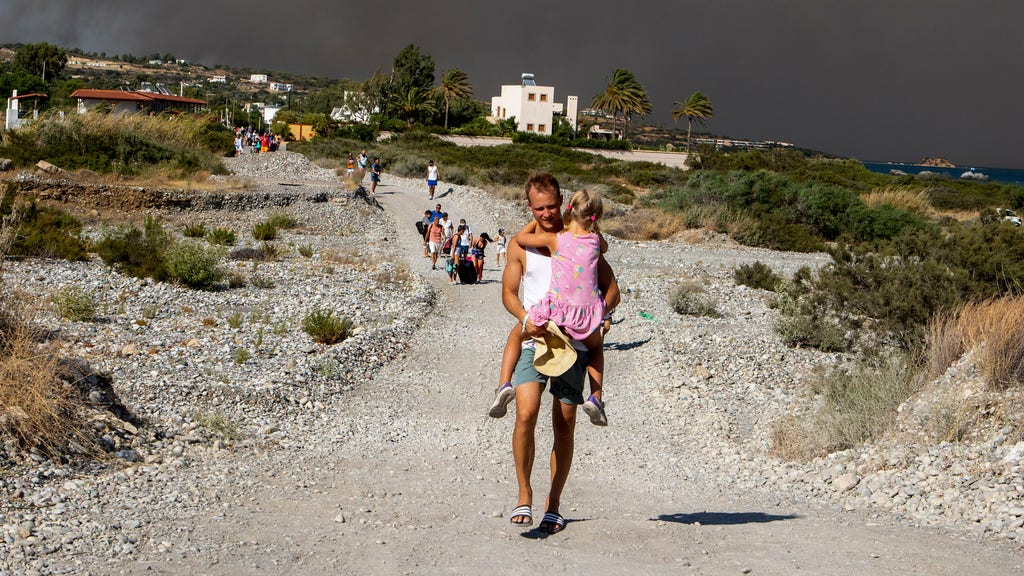 Charter companies are canceling flights to Rhodes, which has been devastated by the fire